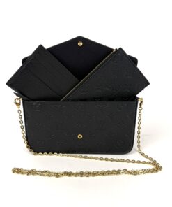 Louis Vuitton Felicie pochette in black Monogram Empreinte leather with gold chain and two inserts