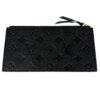 Back of the zip pouch insert showing the embossed leather