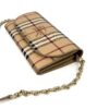 Wallet with the chain coiled beside it