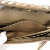 Interior held open showing the lining and pockets