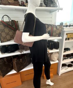 Statement flap carried by a mannequin in the boutique