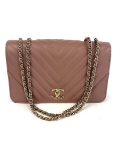 Chanel Small Statement flap bag in pink mauve chevron quilted calfskin with gold-tone chain and CC turnlock