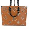 Caramel side of the tote with the giant monogram print