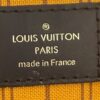 Leather tag reading LOUIS VUITTON PARIS made in France
