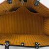 Interior showing the mustard striped lining