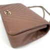 Side of the bag showing the flap and chain