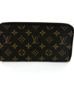Louis Vuitton Zippy Organizer wallet in Monogram coated canvas with gold zip and brown leather lining