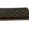 Closed wallet at an angle with the zip running along the edge