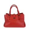 Front of the satchel with both rolled handles standing upright
