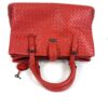 Overhead view of the satchel and its centre clasp
