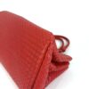 Underside of the satchel photographed at an angle