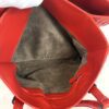 Interior showing the taupe suede lining and zip pocket