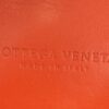 BOTTEGA VENETA MADE IN ITALY embossed into the red leather