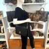 Pochette Metis worn crossbody by a mannequin in the boutique