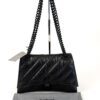 Front view of the bag shown with its grey drawstring dust bag