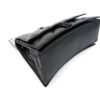 Top edge angle showing the matte black B closure on the flap