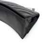 Top down view along the flap edge and rolled leather trim