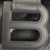 Close up of the embossed B logo and BALENCIAGA name on the closure