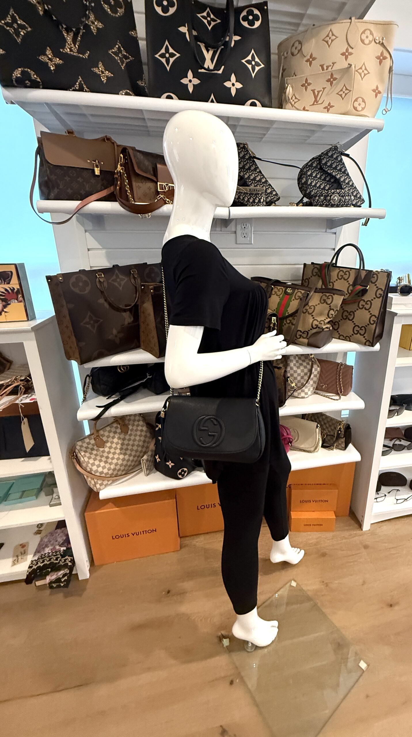the crossbody worn on the shoulder in the showroom