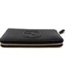 end panel with the gold zip running around the wallet