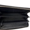 interior showing the GG monogram lining and bill compartments
