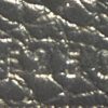 serial code embossed into the leather, black on black