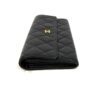 front angled view standing upright on the quilted flap