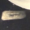 Serial sticker inside the case, worn and no longer legible