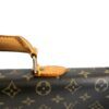 Handle attachment tab and brass ring on the canvas