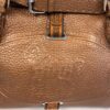 Close up of the embossed horse motif and belt loop