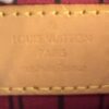 Heat stamp reading LOUIS VUITTON PARIS made in France
