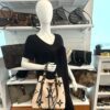 The Neonoe styled on a mannequin in the shop