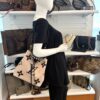 Styled on a mannequin, worn crossbody