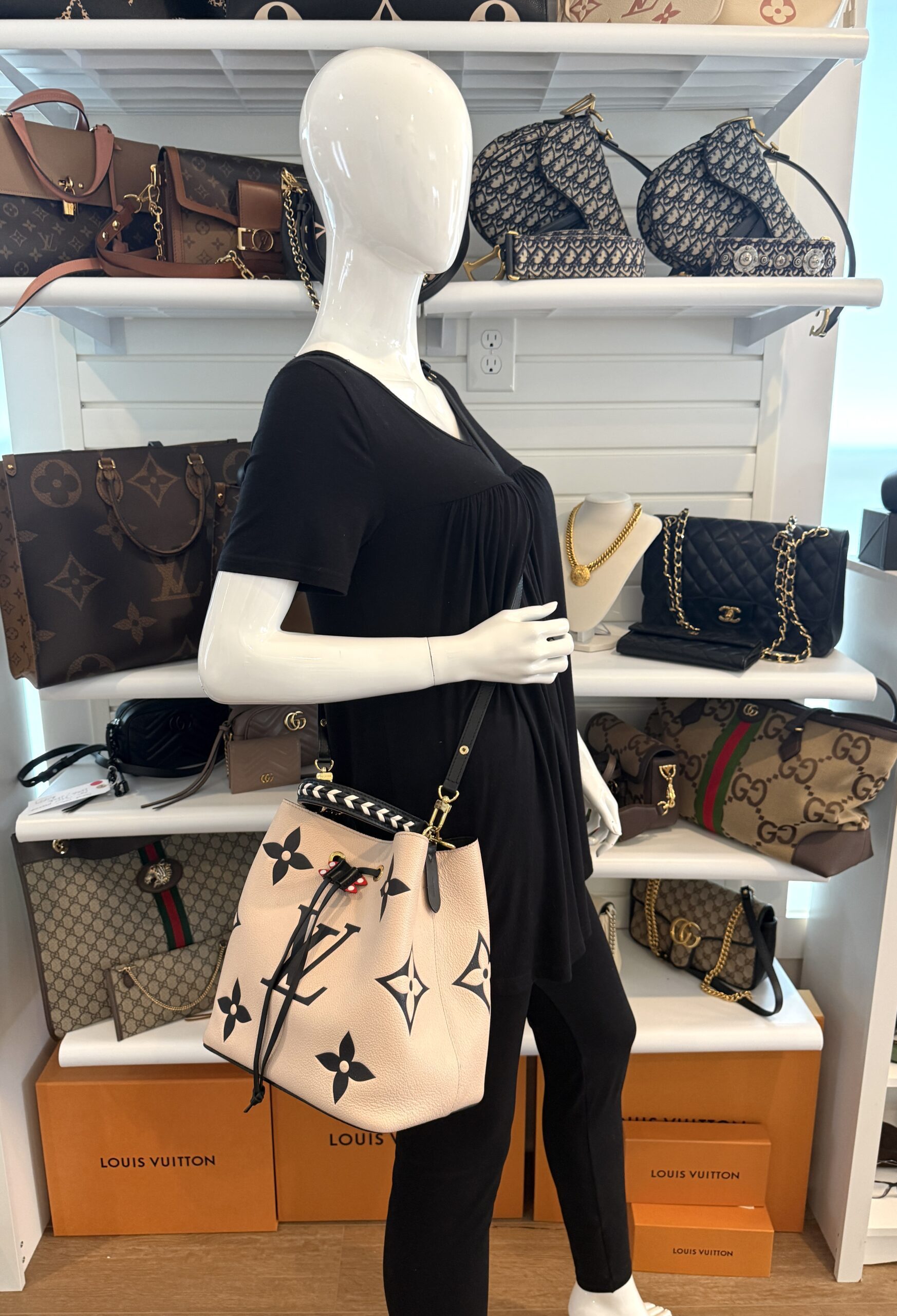 Styled crossbody on a mannequin from another angle
