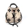 Front view with the braided top handle up