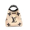 Back view with the giant LV in black