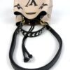Turned over with the braided handle and strap