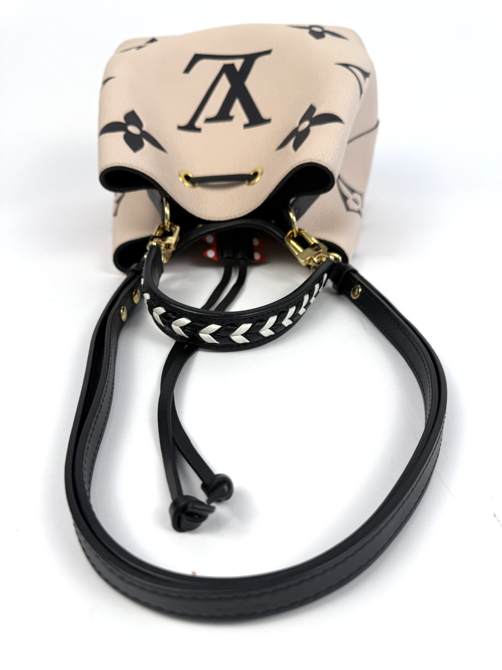 Turned over with the braided handle and strap