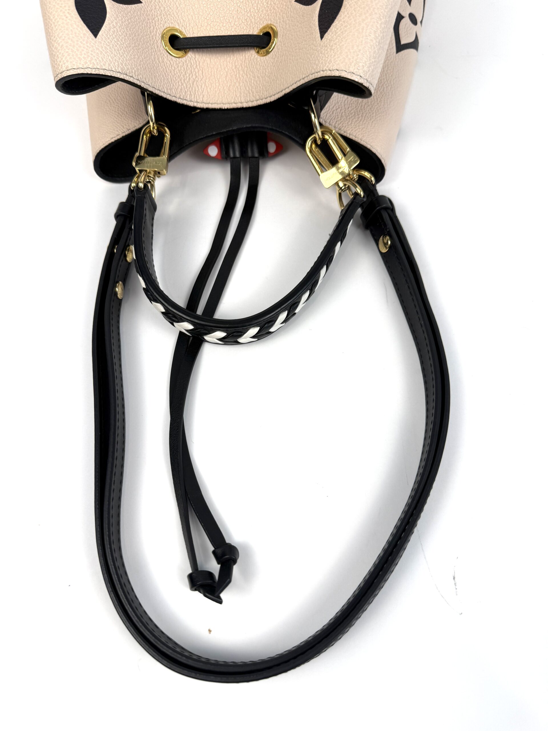 Braided handle and drawstring cords close up