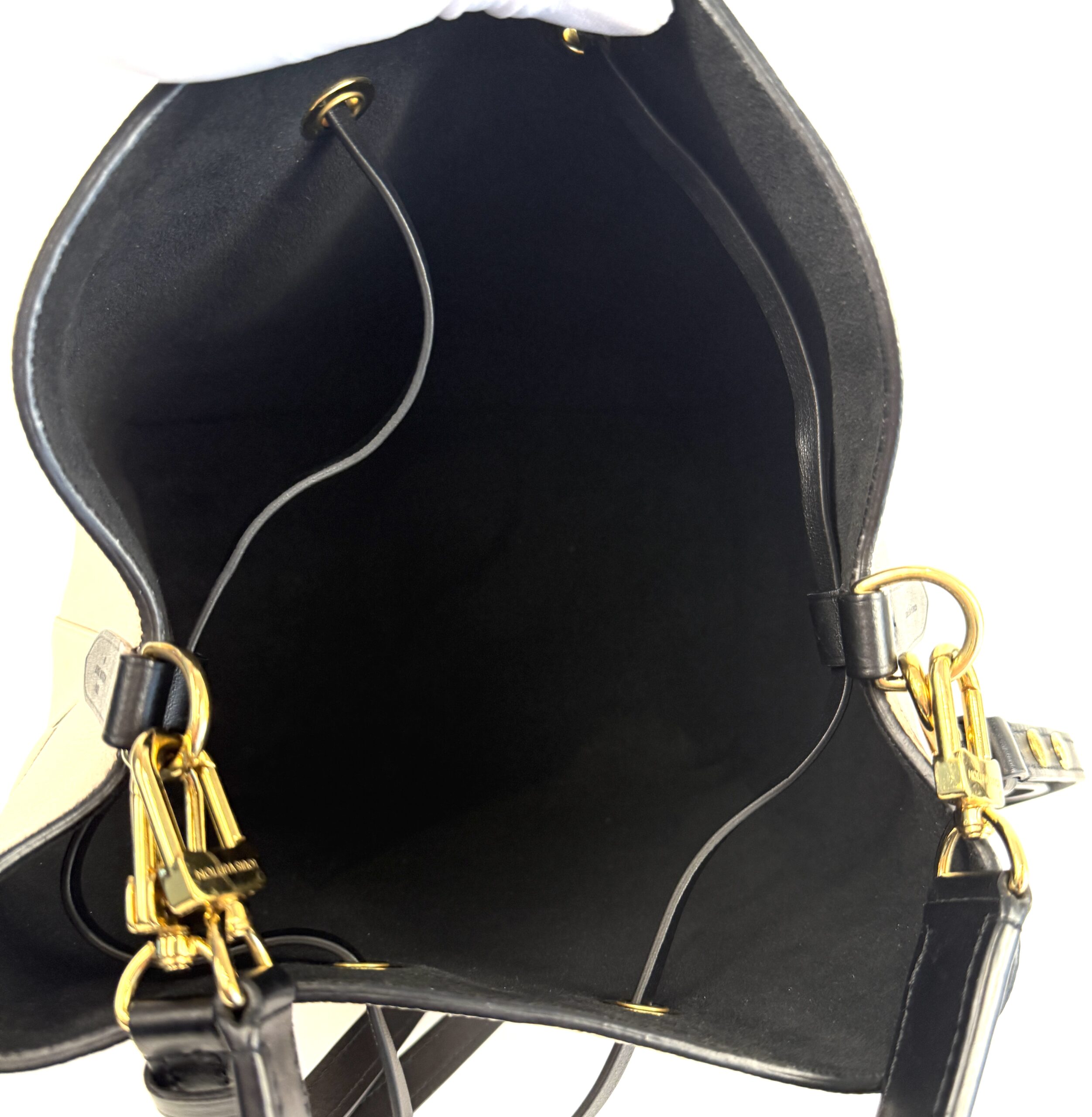 Black microfiber interior with the drawstring loosened