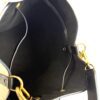 Interior edge with the gold strap clasps