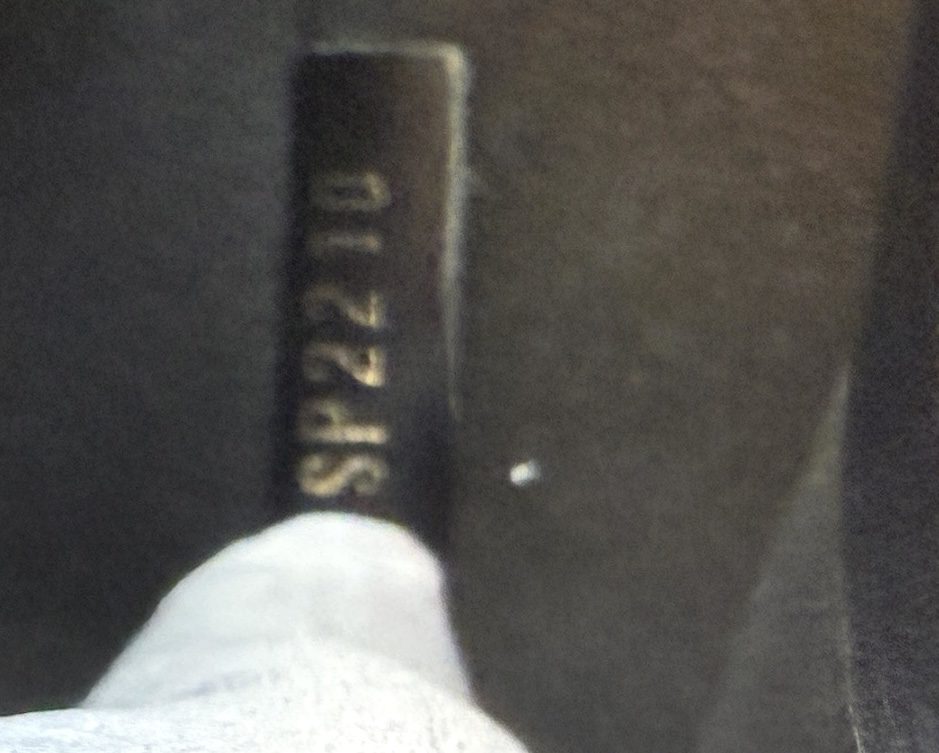 Date code SP2210 stamped inside