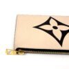 Close up of the embossed flower and gold zip pull