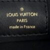 Pochette label reading LOUIS VUITTON PARIS made in France