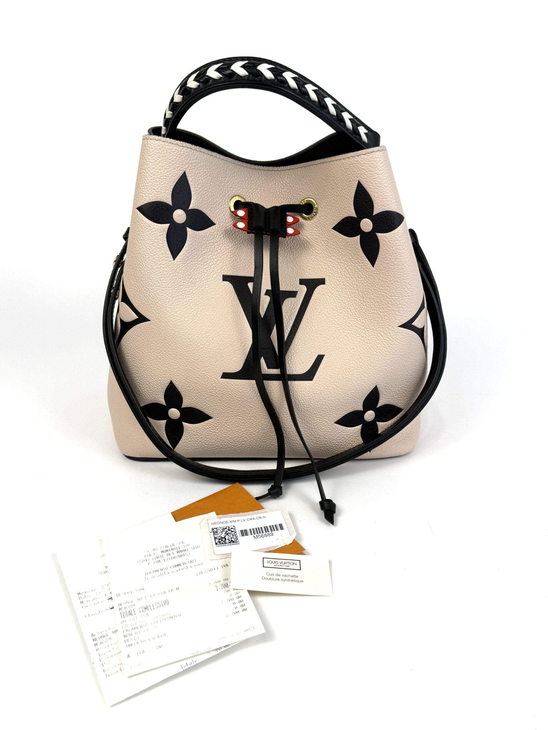 Front view with its receipt, care card and tags