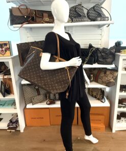 The Neverfull GM styled on a mannequin in the shop