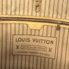 Interior zip pocket and leather label