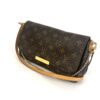 Louis Vuitton Monogram Favorite MM Handbag, front view with the leather shoulder strap