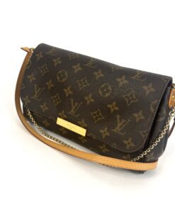 Louis Vuitton Monogram Favorite MM Handbag, front view with the leather shoulder strap