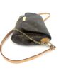 Three quarter side view with the strap clasp